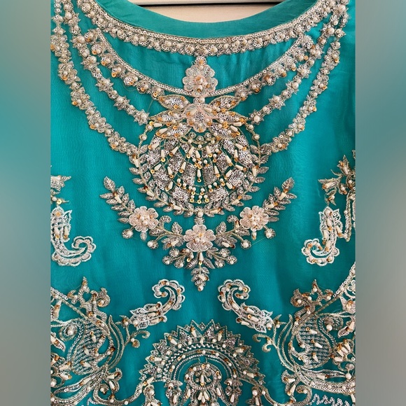 This Beautiful Mehr dress has full embroidery on its sleeve front and back. - Picture 2 of 4